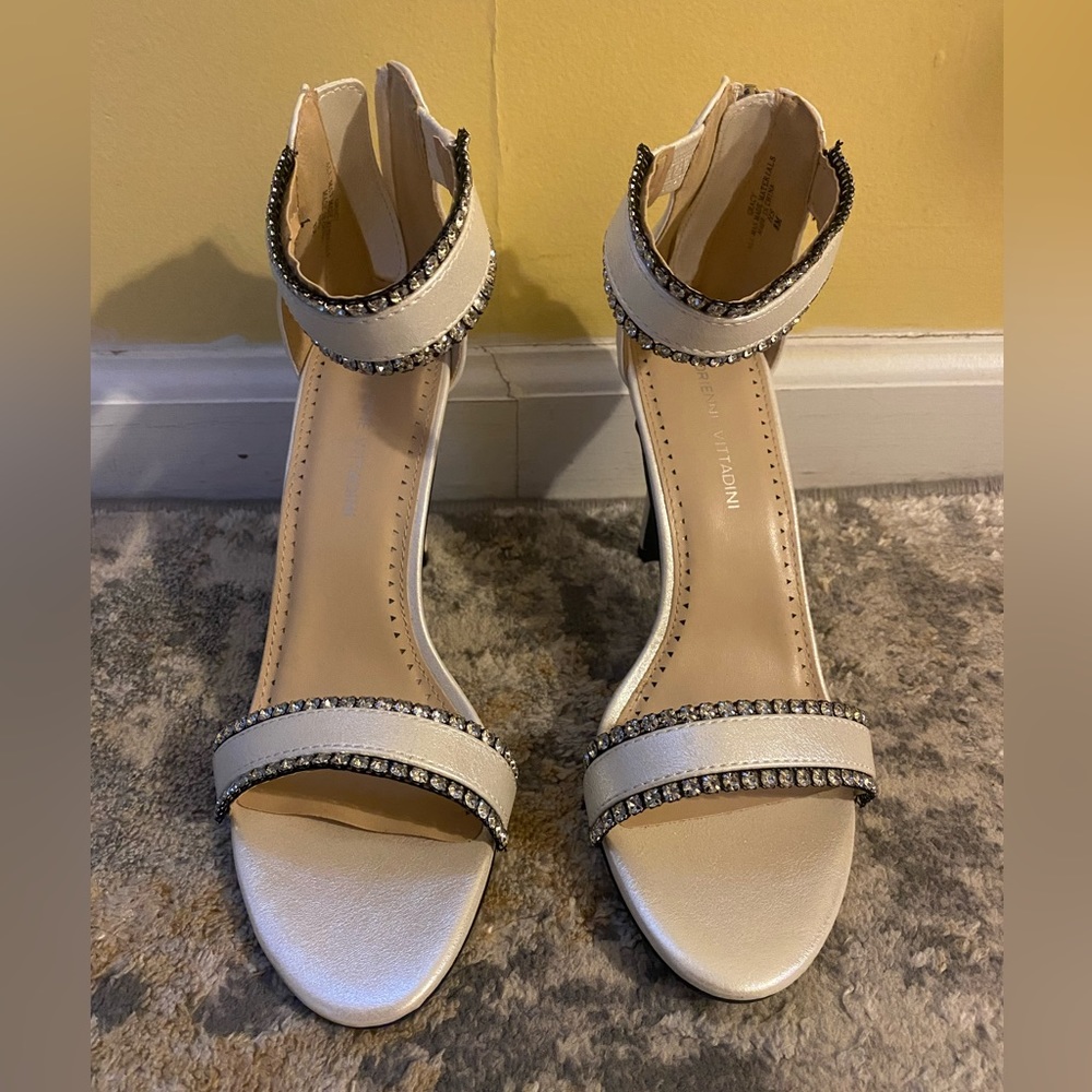 BRAND NEW. Elegant sandals encrusted in glitzy rhinestones, cream